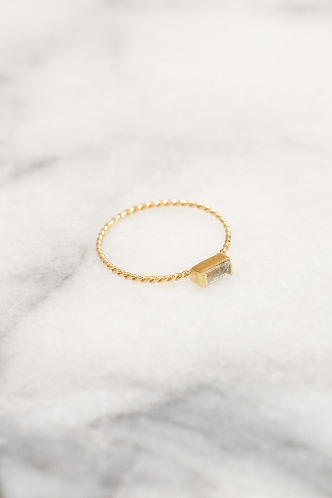 white sapphire baguette gold stacking ring