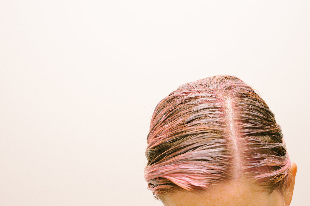 overtone pastel pink color conditioner on hair model