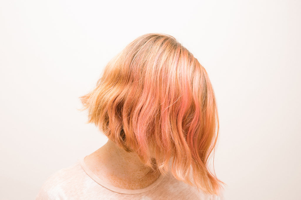overtone pink hair conditioner on model hair 
