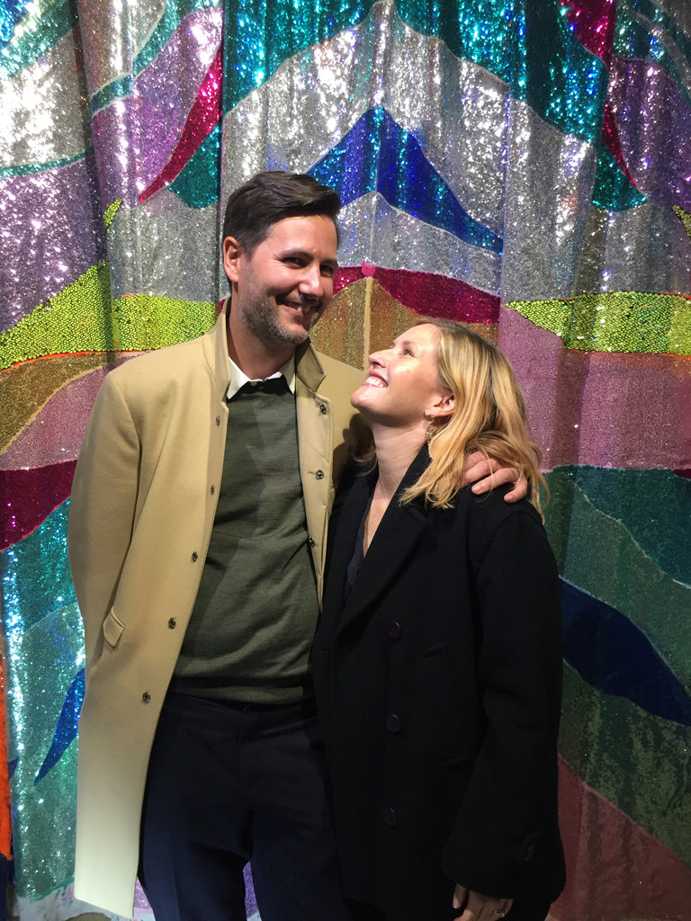 Janna Conner and Raf Niclaes in glitter chamber glitter rainbow backdrop by Kelly Brumfield-Woods