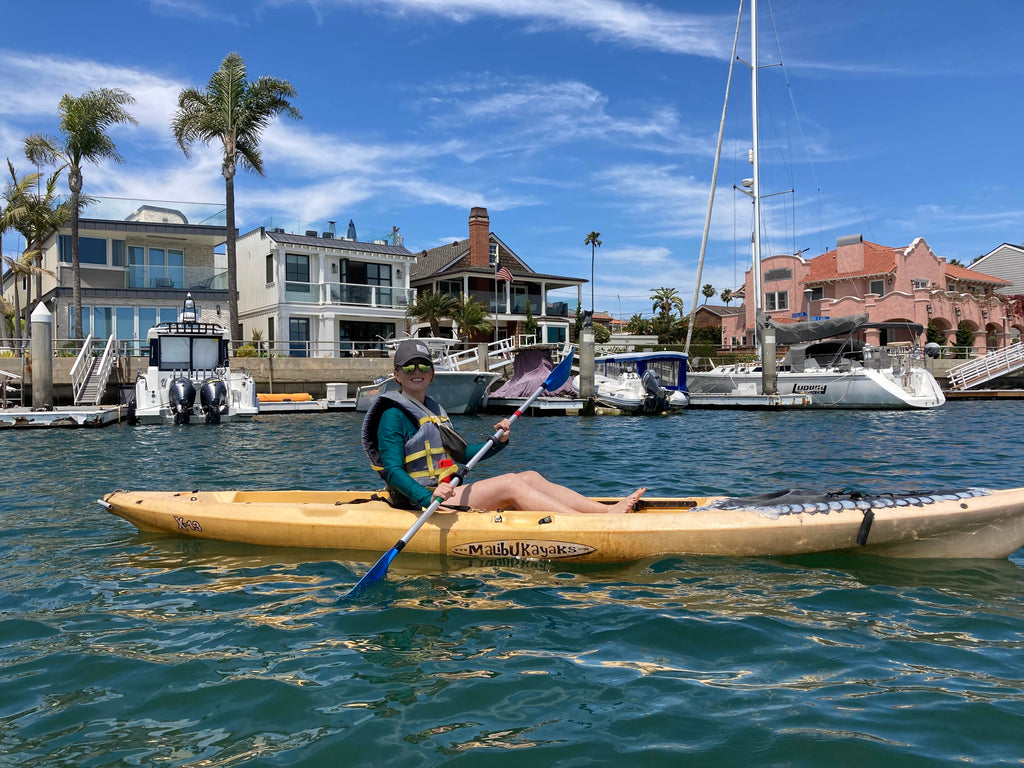 Janna Conner on kayak in Long Beach Naples Island