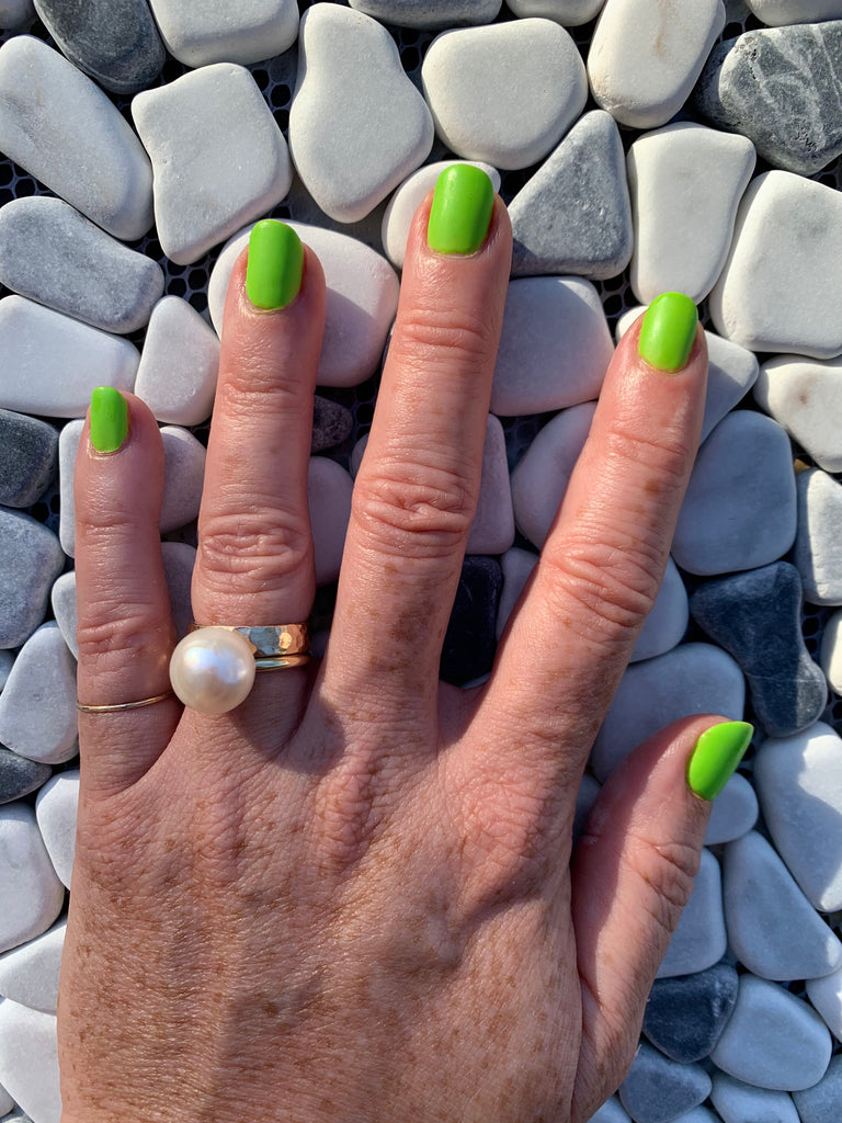 neon green nail polish pearl ring 