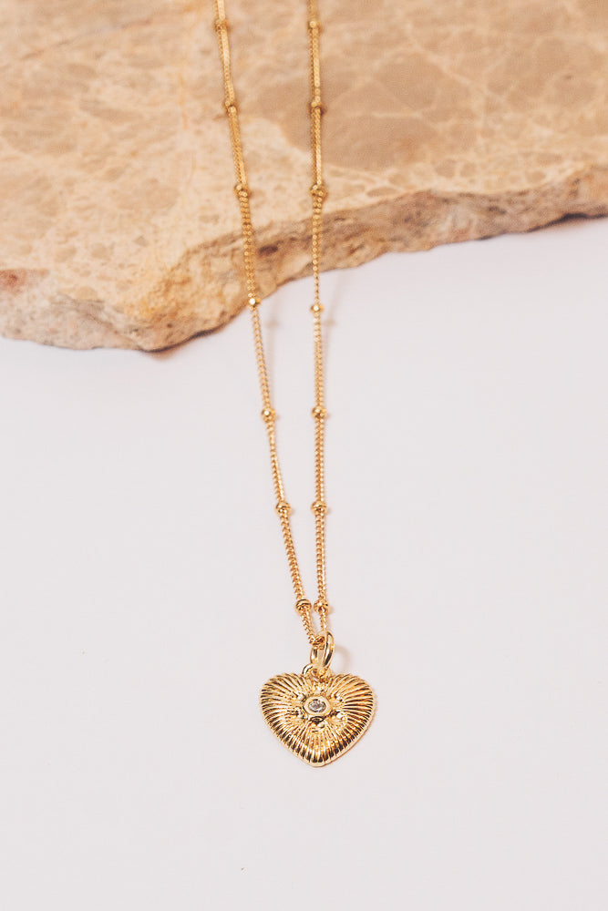 gold heart charm necklace with beaded chain