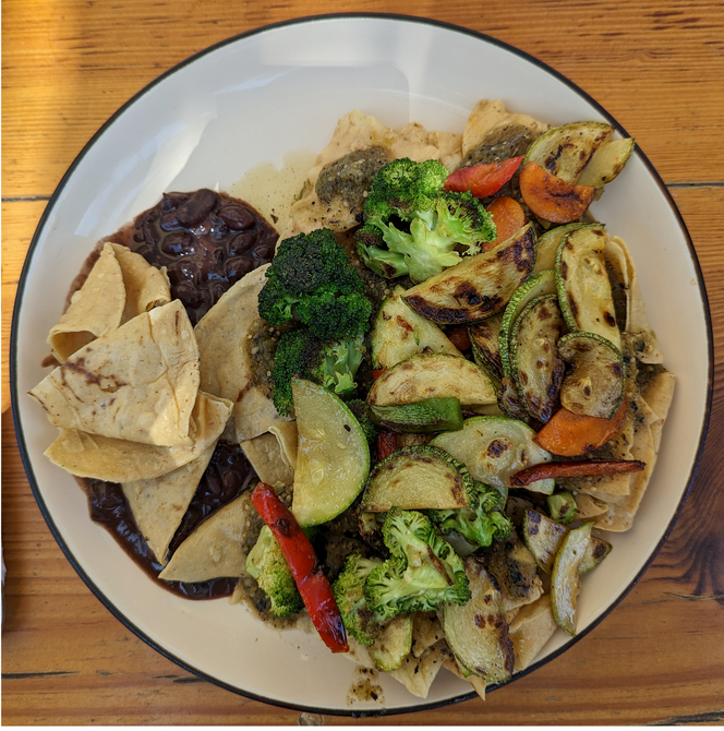 Chilaquiles from Mareta topped with veggies and salsa verde.