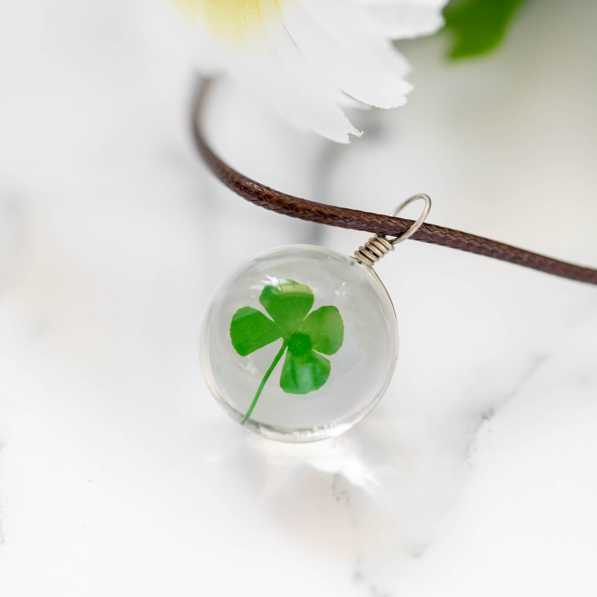 real four leaf clover pendant