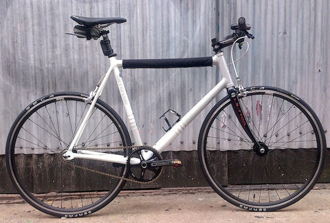 Image of Cannondale Capo with custom hand made fixie wheels made by XLR8 Wheels.