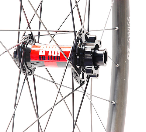 DT Swiss 240s hub laced into a carbon rim by XLR8 Performance Bicycle Wheels front hub