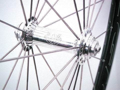 Image of custom cyclocross wheels built by XLR8 wheels using HED Belgium+rims and White Industries T11 hubs. Front hub pictured.