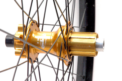 Hope MTB hubs rebuilt onto Syntace W35 wide alloy rims, by XLR8 Performance Bicycle Wheels. Rear hub and rim shown.