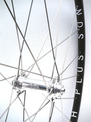 Photo of XLR8 custom cyclocross alloy wheels using Hplusson Archetype on White Industries T11 hubs. Front shown.