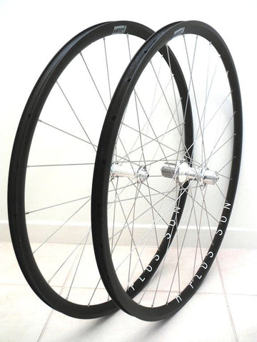 Photo of XLR8 custom cyclocross alloy wheels using Hplusson Archetype on White Industries T11 hubs.