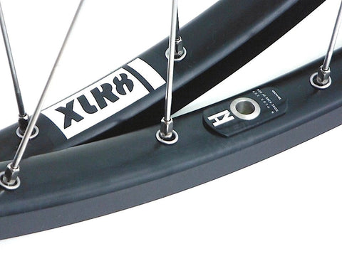 Picture of Hplusson TB14s 700c rims in black, with XLR8 wheels decal.