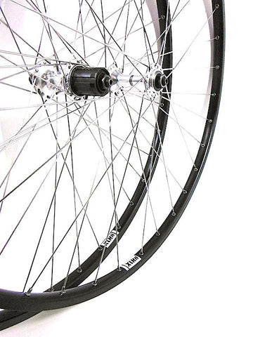 Pic of XLR8 Wheels custom hand built Hplusson TB14s road bike rims on Shimano 600 Tricolor hubs.