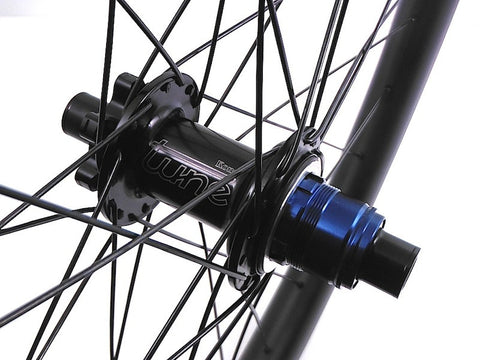 Photo of custom carbon 650b Enduro MTB wheels using Tune King and Kong Hubs, but XLR8 Wheels. Rear hub shown.