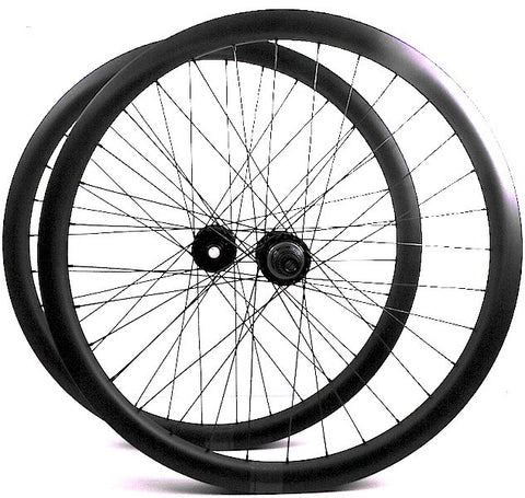 Image of custom carbon 650b Enduro MTB wheels using Tune King and Kong Hubs, but XLR8 Wheels. Pair of wheels shown.