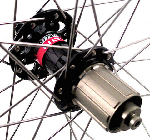 Picture of custom handmade gravel road cyclocross disc wheelset by XLR8 wheels using Hplusson Hydra tubeless rims on Novatec rear 772 hub.