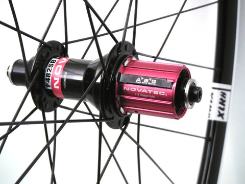 Image of XLR8 wheels custom alloy cyclocross road gravel wheelset using Kinlin XC279 rims and Novatec hubs. Rear hubs with ABG shown.