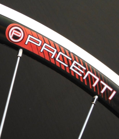 Image of custom XLR8 wheels Pacenti SL23 road bike alloy wheels on White industries T11 silver hubs. Decal shown.