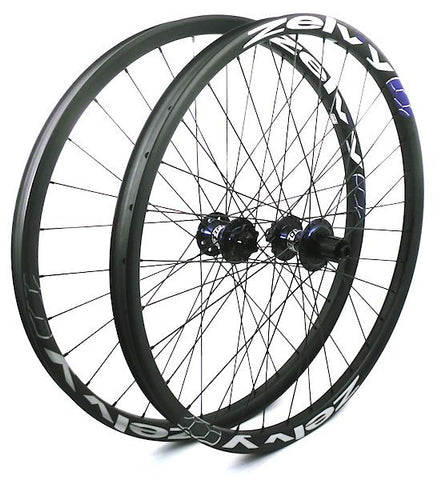 Picture of custom carbon MTB wheels using Project 321 hubs on Zelvy Carbon rims.