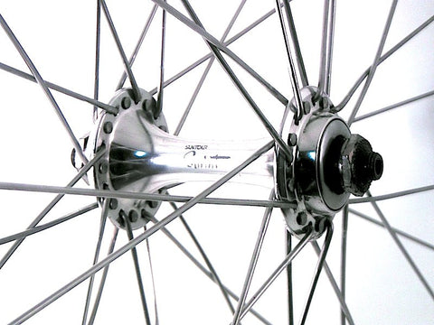 Photo of retro classic custom bike wheels by XLR8 Suntour Sprint on Hplusson TB14 grey ano rims. Front hub shown.