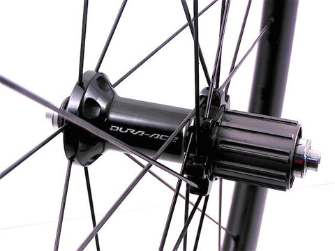 Image of Shimano Dura Ace rim replacement using 38mm carbon toroidal tubeless ready clincher rims, by XLR8 Wheels.