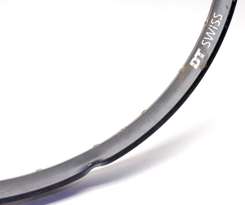 Photo of smashed DT Swiss M1700 rim, repaired with a Spank Oozy Trail 295 rim by XLR8 Performance Bicycle Wheels,