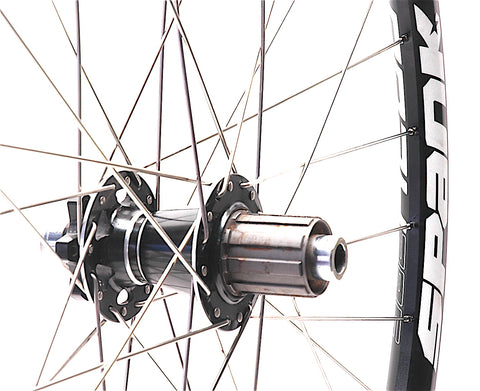 Spank Oozy Trail 295 rim laced onto Giant XC hub by XLR8 Performance Bicycle Wheels side