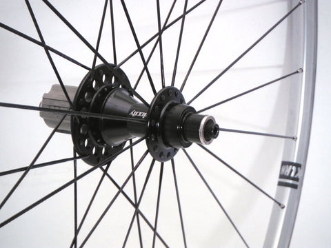 Photo of custom road alloy bicycle wheelbuild using Velocity Pro hubs and A23 rims with DT aerolite spokes Rear.