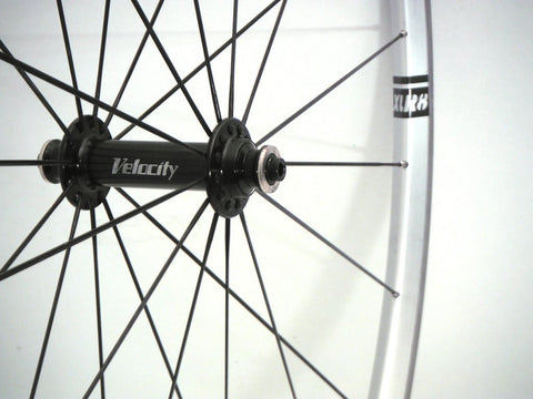 Image of custom road alloy bicycle wheelbuild using Velocity Pro hubs and A23 rims with DT aerolite spokes front.