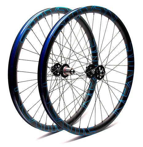 White Industries XMR hubs on Nextie Premium Carbon rims angled by XLR8 Performance Bicycle Wheels