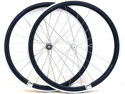 Photo of XLR8 wheels custom handmade hybrid carbon alloy road bike wheels using XLR8 MD hubs and Alexrims 40mm deep rims. Wheelset photo.