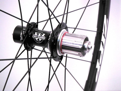Zipp 202 188 hub replacement with White Industries T11 titanium freehub in gloss black.