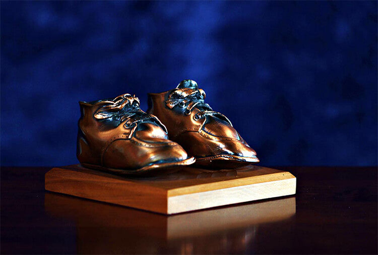 bronzed baby shoes with antique look
