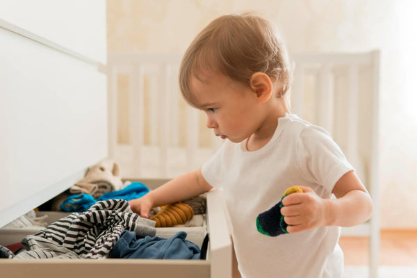 toddler choosing clothes