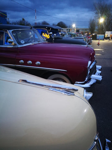 Rhythm Riot classic 1940s vintage American cars in twilight