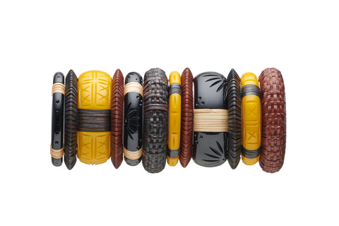 Splendette vintage inspired 1940s 1950s tropical style stack of fakelite cane bangles with dark and mid woven bangles. Black Panther and yellow Ochre.