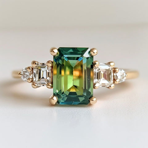 Alternative non-traditional Engagement Ring emerald cut green teal sapphire and emerald cut accents