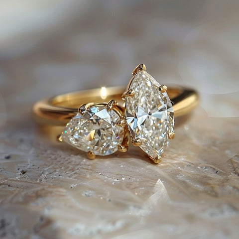 Alternative non-traditional Engagement Ring tot et moi style with pear and marquise prong set diamond