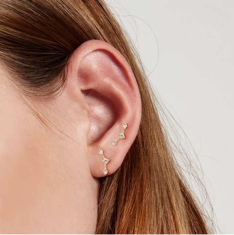 the ear climber trend Artemis constellation celestial ear climbers 14k gold diamonds