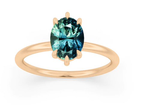 oval cut teal ethical sapphire engagement ring