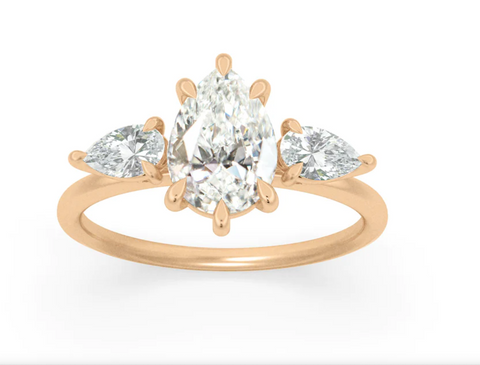 pear cut 3 stone engagement ring