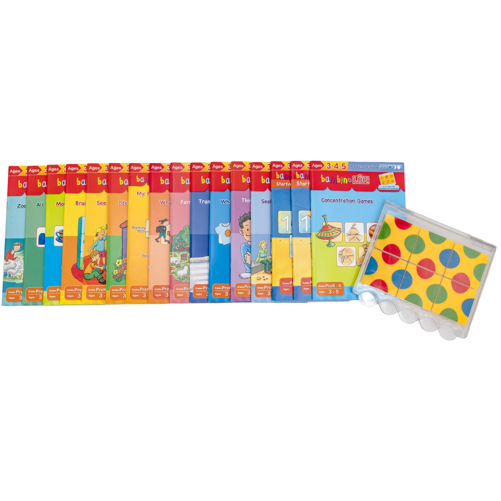 16 Bambino L U K books spread out to show partial covers. Each cover is a different color with illustrations on each. The top visible cover shows squares with images in them of a metal top, a paper-wrapped boat, a paper-wrapped ball, and a paper-wrapped metal top. Over the top of thsis cover is the Bambino LUK controller. It is a clear, hinged, flat plastic with tiles inside. The 6 tiles, 3 on top and 3 on bottom, are yellow with blue, green, and red dots.