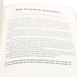 A close-up shot of and inside page of the What’s Your Worldview book. The title, blurred in the distance is “The Freedom Question.” Below the titled is blurred text that comes in to view toward the bottom of the page. The paragraphs of text ends with 2 bolded questions; “If you answered yes to the Freedom Question, go to page 20. If you answered no to the Freedom Question, go to page 20.”