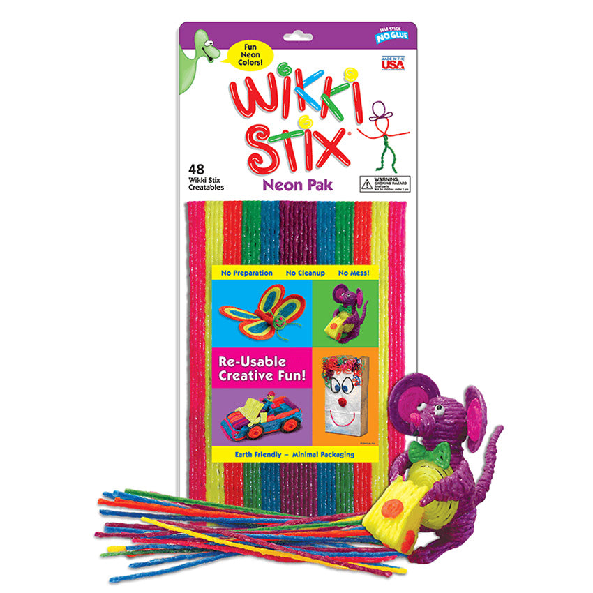The Wikki Stix Neon Set. The packaging shows 48 wax sticks all stick together inside the package. On the package are several completed projects using the sticks, including; a cowboy, butterfly, mouse with cheese, card, and paper bag with a Wikki Stick designed face. In front of the package are several Wikki Stix spread out to show the many colors. To the right is a purple mouse holding a large chunk of cheese and wearing a green bowtie. All Created by Wikki Stix.
