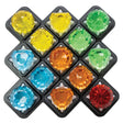 The Diamond Quest Smart Game board with all the gem pieces in place. The gem pieces are red, orange, yellow, green, and blue. There are 3 of each color, but only 1 red in the lower-right corner.