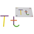 GeoStix Letter Construction activity card and project. The card on the right is showing a capital and lowercase T, and the pieces needed to complete the activity are in the upper-right. On the left are capital and lowercase T’s created with the GeoStix pieces. The straight and curved pieces that make up the letters are purple, green, yellow, and orange. The straight and curved pieces are in many colors and snapped together to create the shapes.