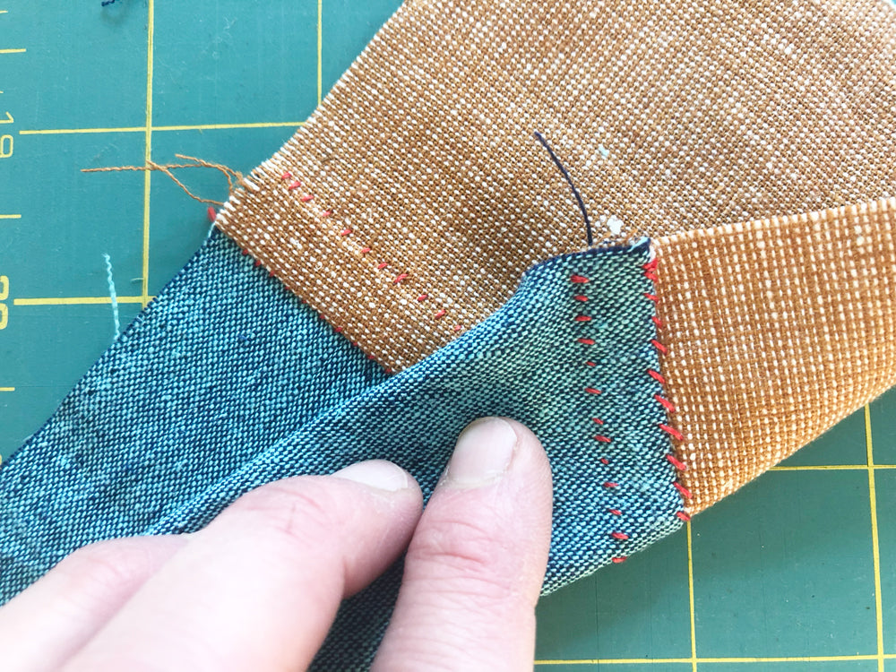 Bojagi-inspired flat-felled hand-sewn seam