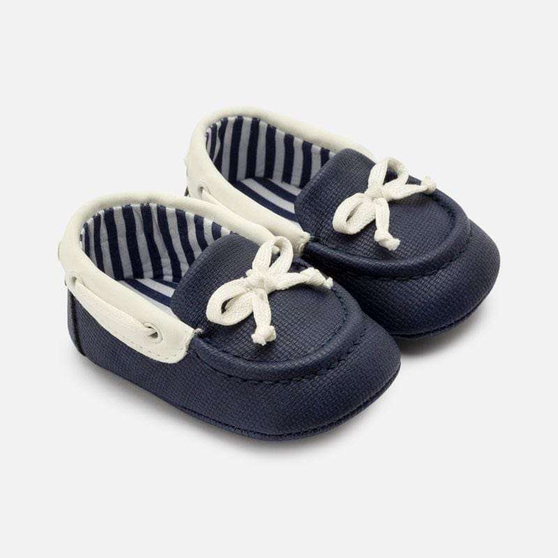 navy and white boat shoes