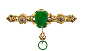 Jade and brown diamond pin, circa, 1920