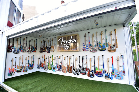 Artist-Painted Louisville Slugger Bat and Fender Guitars